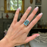 vintage aquamarine and diamond cocktail ring, worn on hand.