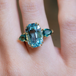 Aquamarine and sea-green tourmaline three-stone cocktail ring