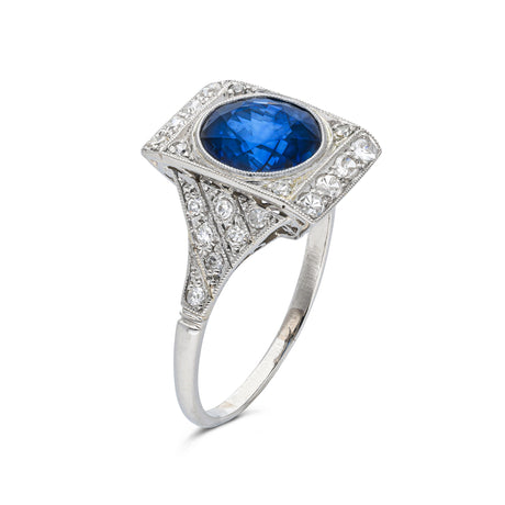 sapphire and diamond panel ring, side view.