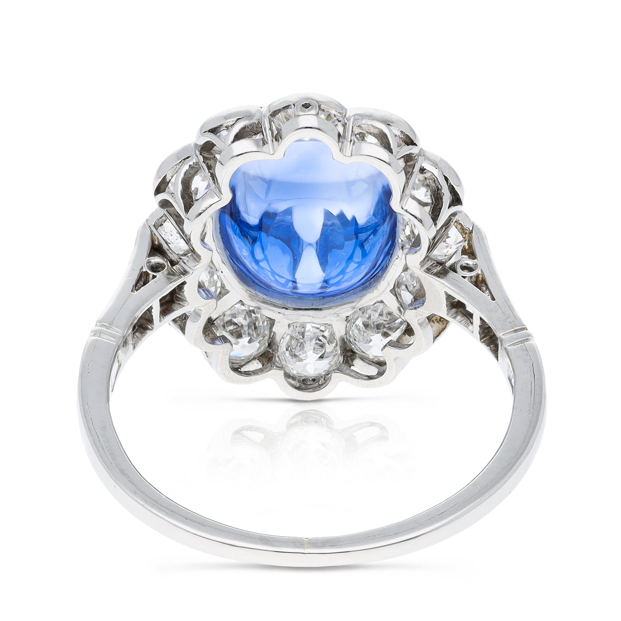 cabochon sapphire and diamond cluster ring set in platinum, back view.