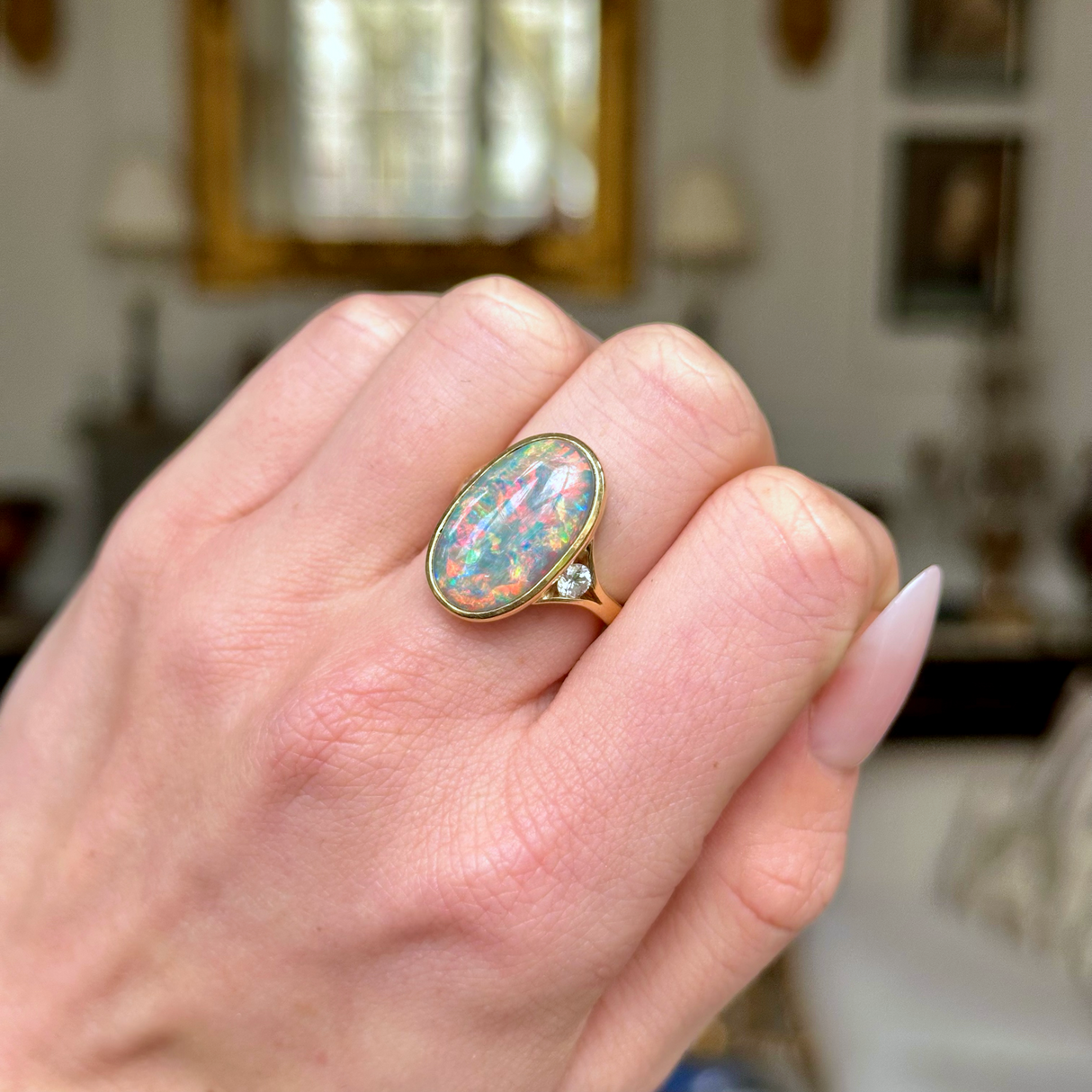 Contemporary, Black Opal and Diamond Cocktail Ring, worn on closed hand.