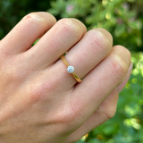 Contemporary, Solitaire Diamond Engagement Ring, 18ct Yellow Gold worn on hand.