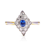 Sapphire and diamond kite shaped ring, front view.