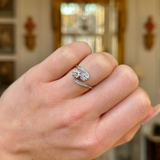 edwardian diamond toi et moi ring worn on closed hand.