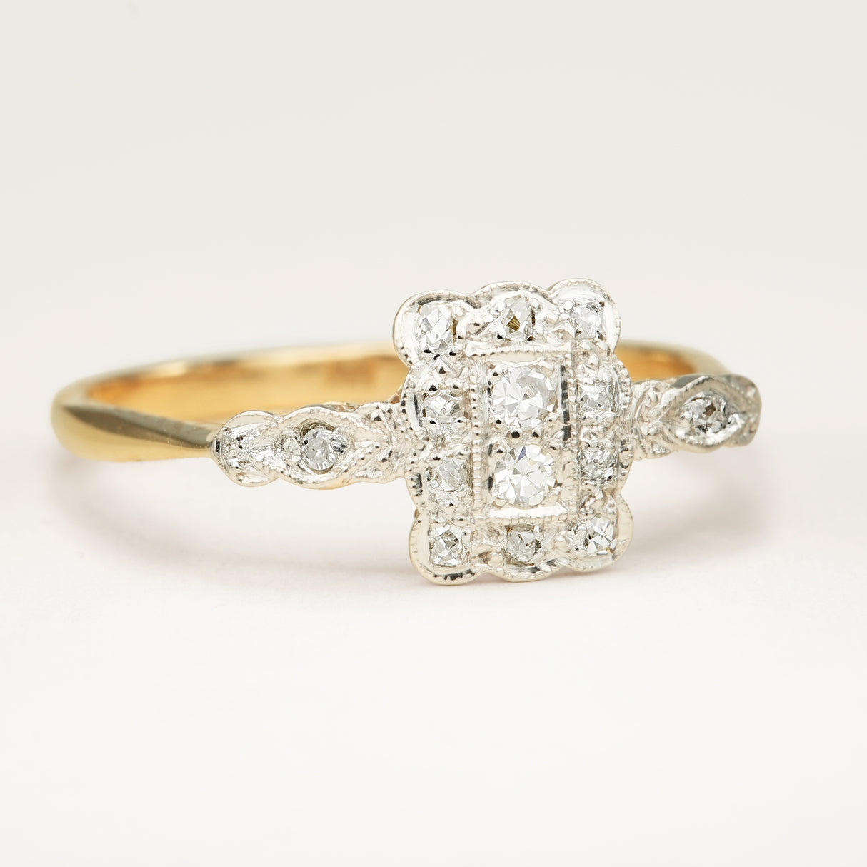 Antique, Edwardian diamond cluster engagement ring