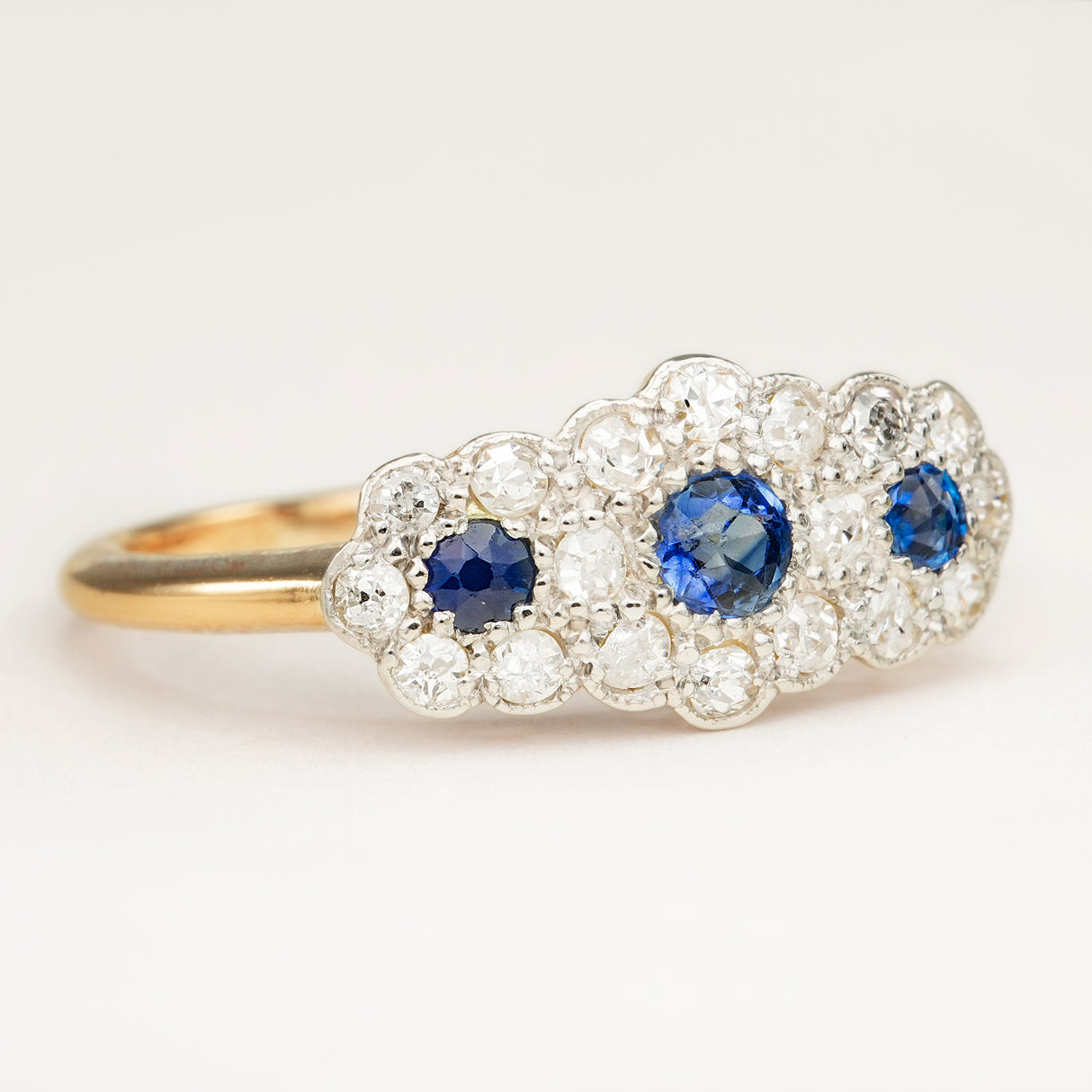 Antique, Edwardian sapphire and diamond triple cluster ring