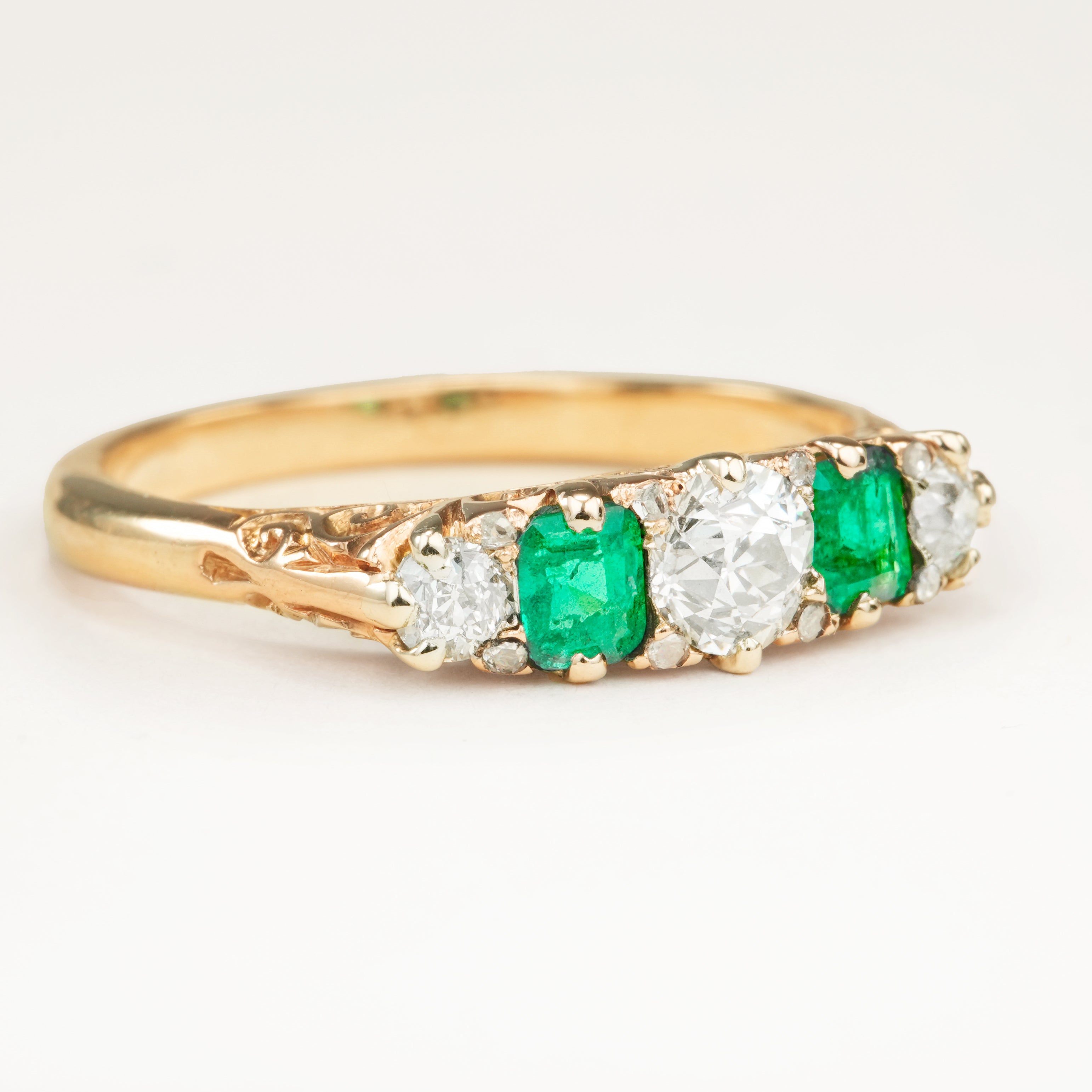 Antique, Edwardian diamond and emerald five-stone ring