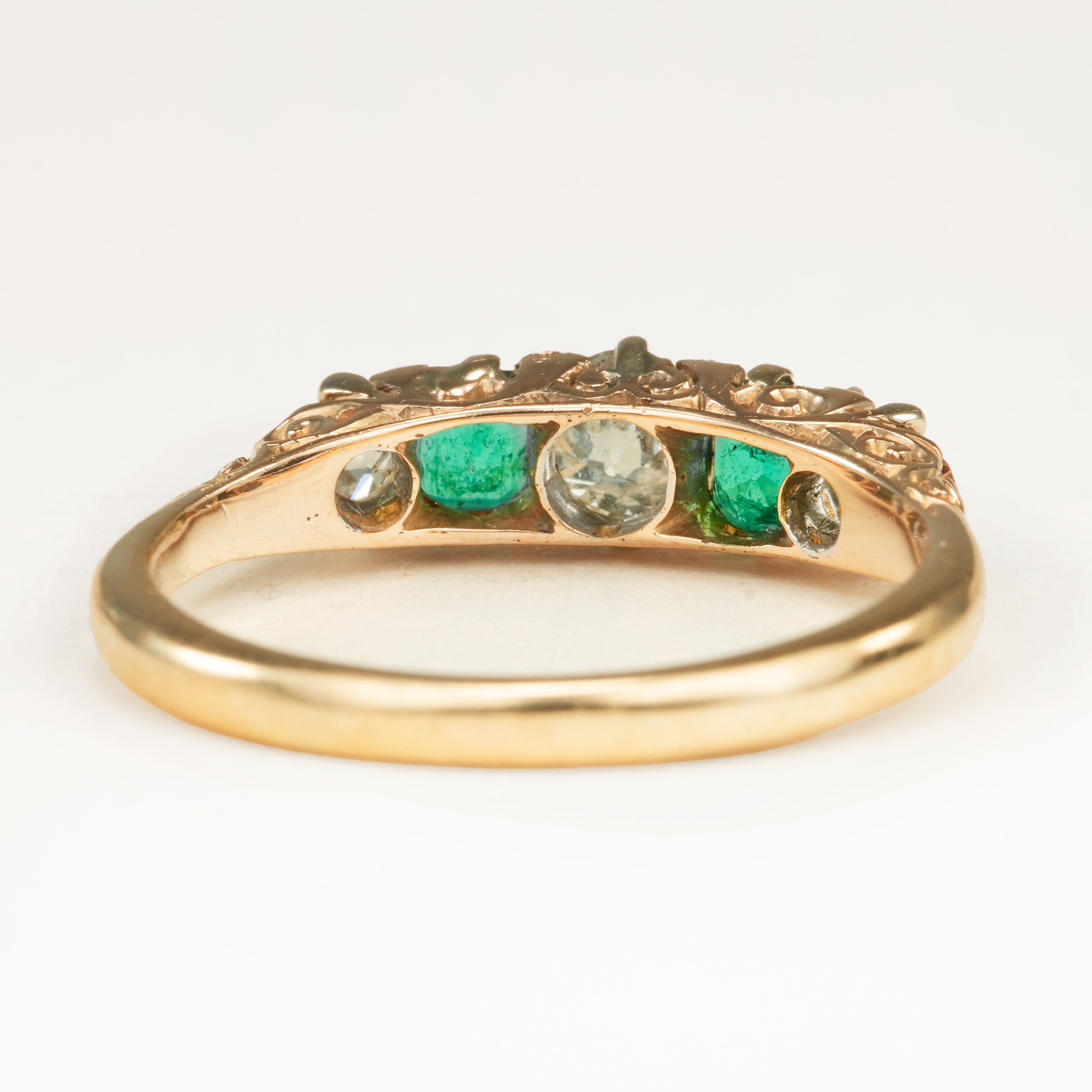 Antique, Edwardian diamond and emerald five-stone ring