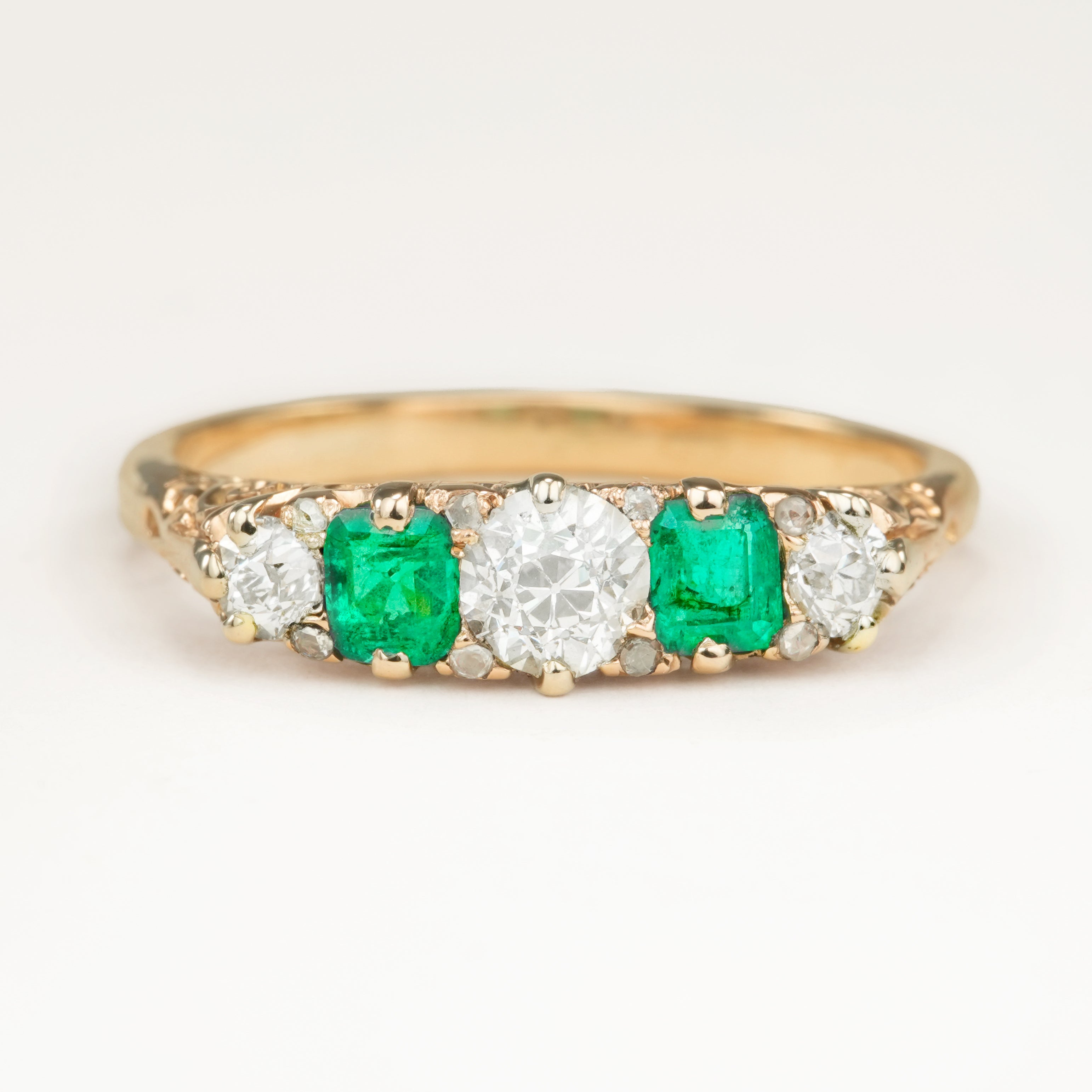 Antique, Edwardian diamond and emerald five-stone ring