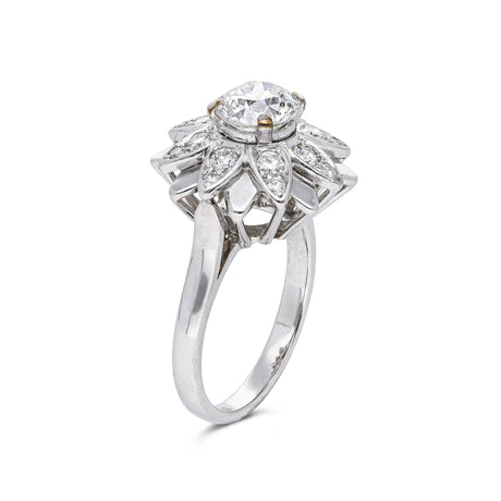 french diamond engagement ring resembling a flower, side view.
