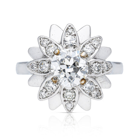 french diamond engagement ring resembling a flower, front view.