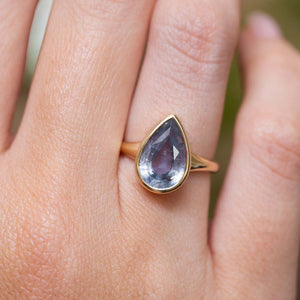 Antique-inspired, blue-grey colour change sapphire solitaire ring