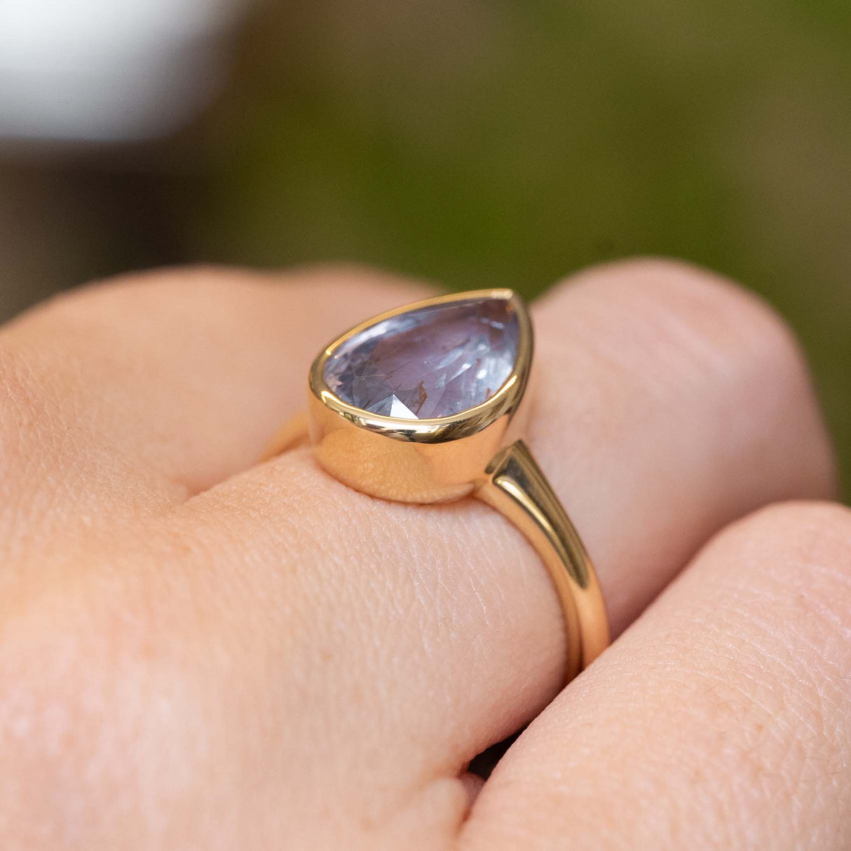 Antique-inspired, blue-grey colour change sapphire solitaire ring