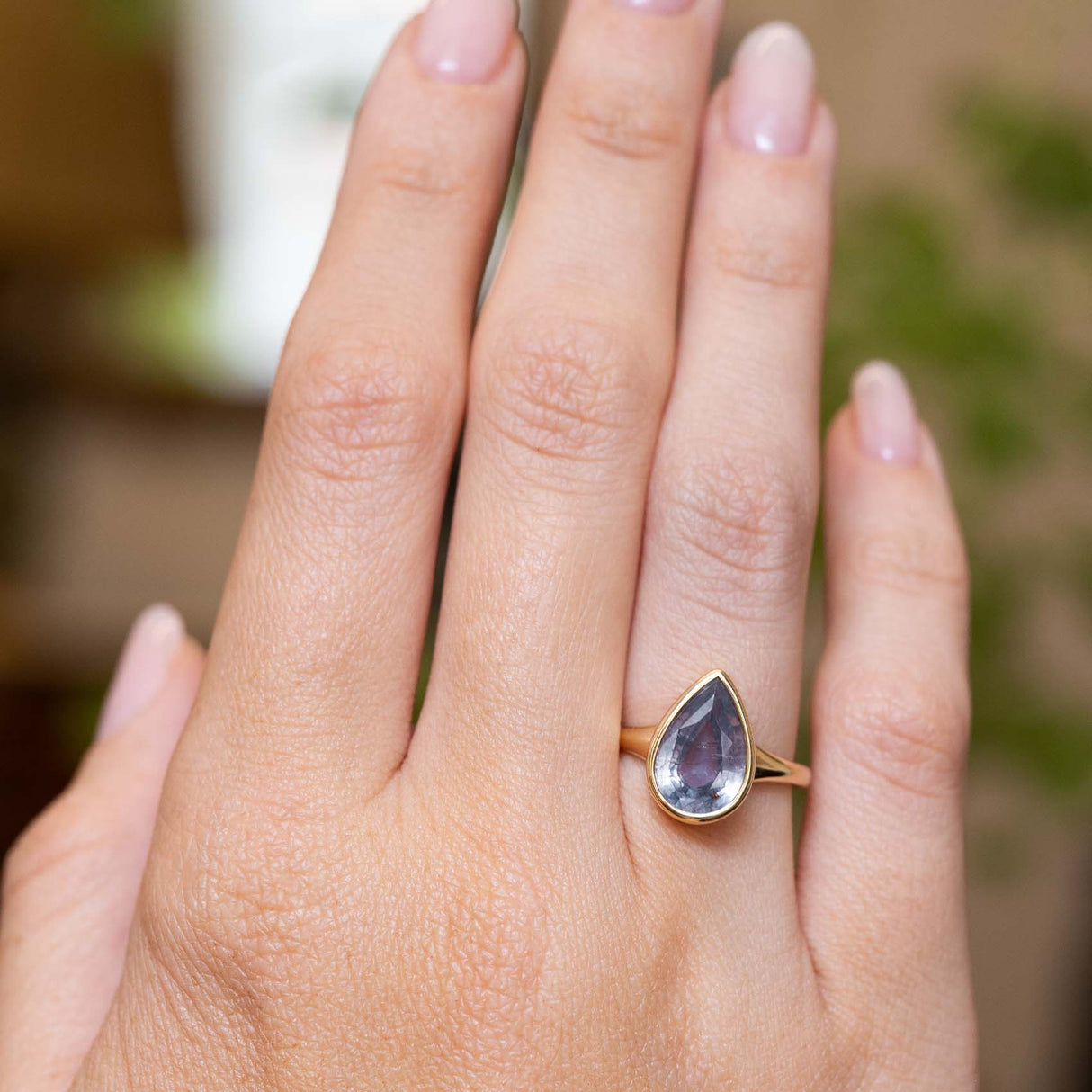 Antique-inspired, blue-grey colour change sapphire solitaire ring