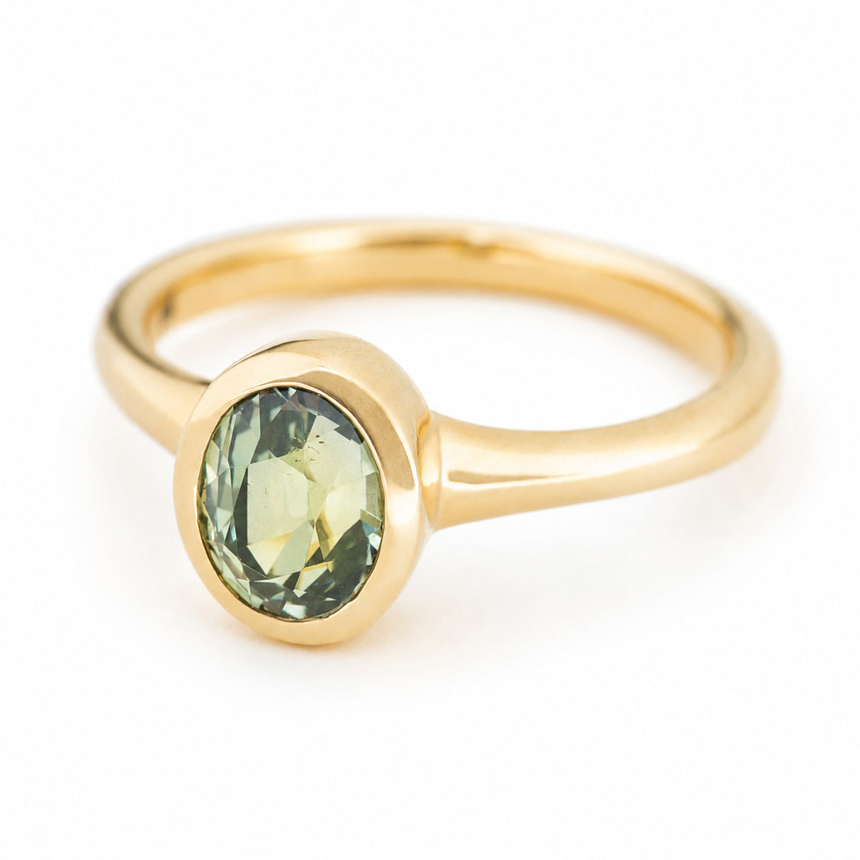 Antique-inspired, green sapphire solitaire engagement ring