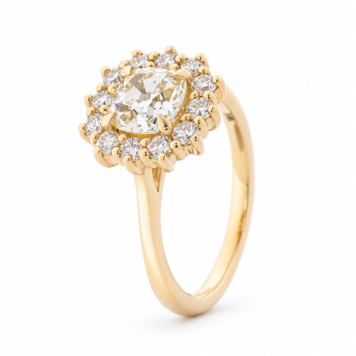 Angled view of the yellow diamond cluster ring, highlighting the raised claw setting and sparkling diamond surround.
