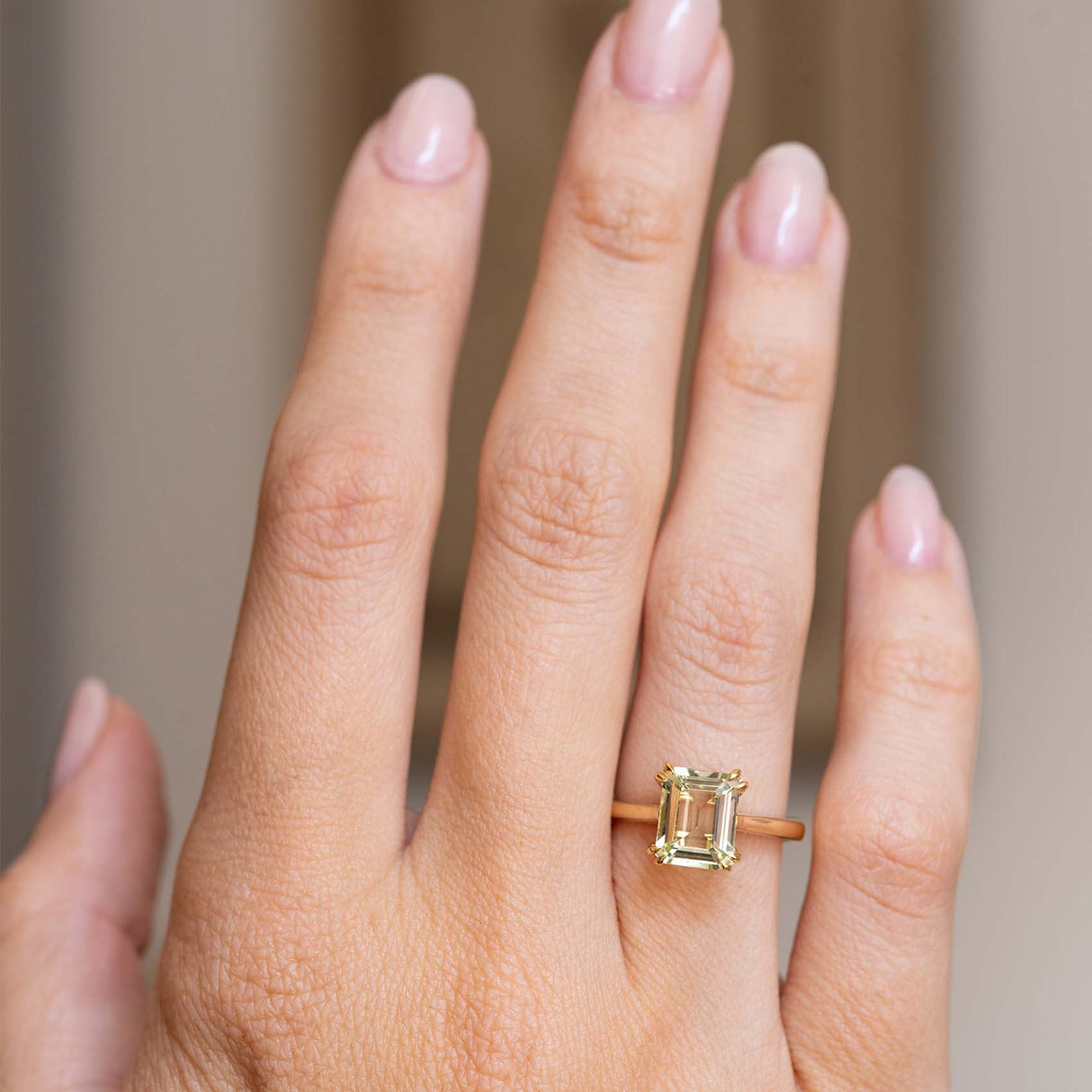 Antique-inspired, green beryl solitaire engagement ring