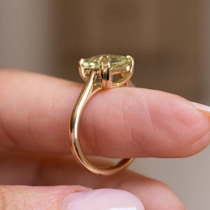 Antique-inspired, green beryl solitaire engagement ring