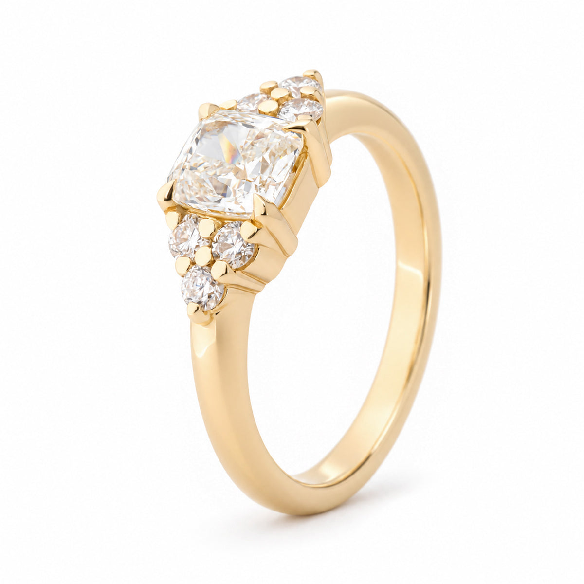 Angled view of the diamond trefoil ring, highlighting the raised claw setting and decorative three-diamond shoulder clusters.