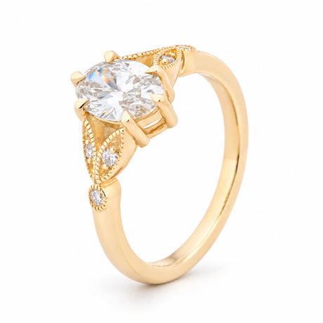 Raised studio view highlighting the diamond centre and intricate botanical gold detailing.