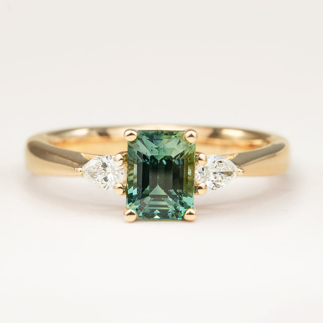 Emerald-cut Yellow-Green Sapphire Diamond Three-Stone Engagement Ring