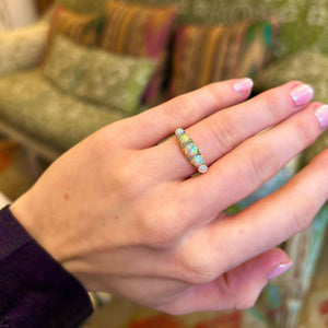 Antique, Edwardian opal and diamond half-hoop ring