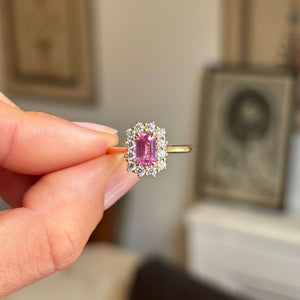 Antique-inspired, pink sapphire and diamond cluster engagement ring