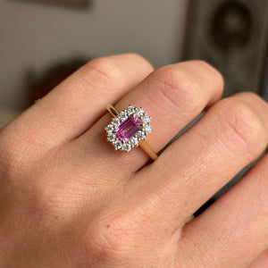 Antique-inspired, pink sapphire and diamond cluster engagement ring
