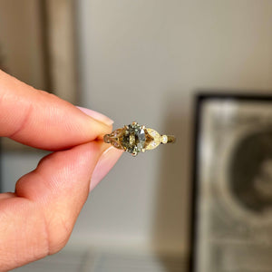 Vintage-inspired, sage green sapphire and diamond engagement ring