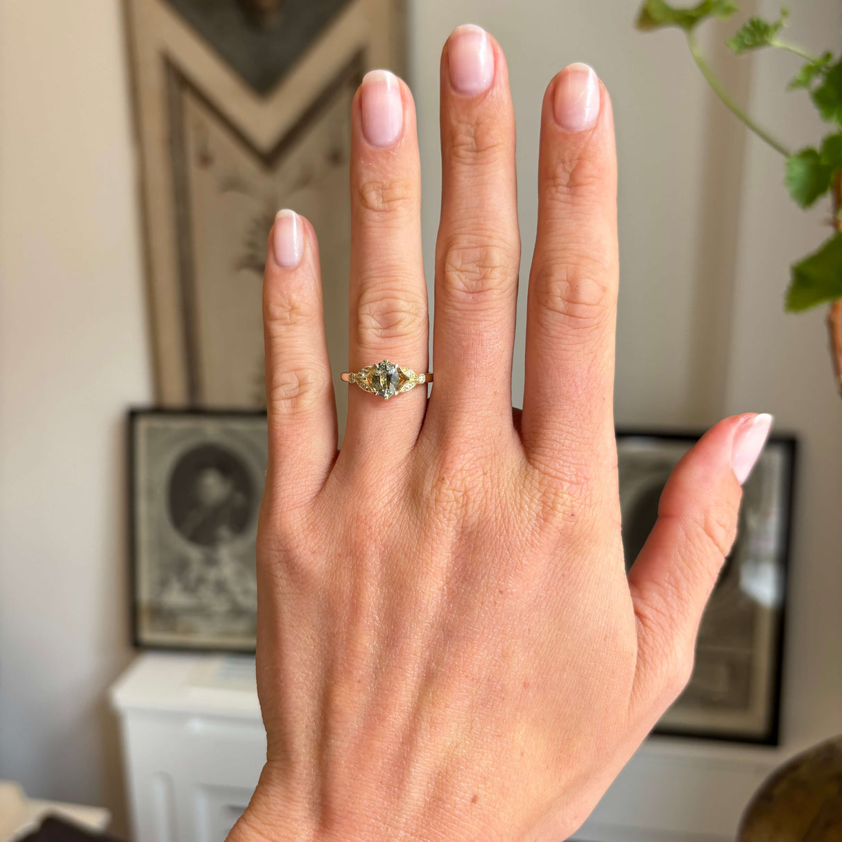 Vintage-inspired, sage green sapphire and diamond engagement ring