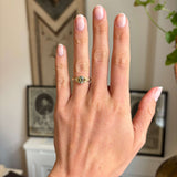 Vintage-inspired, sage green sapphire and diamond engagement ring