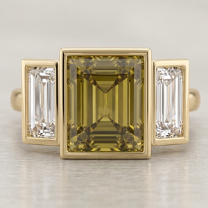 Antique inspired, bespoke chrysoberyl and laboratory diamond three-stone ring