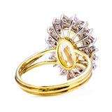 Imperial topaz and diamond cluster ring with gold band, back view.