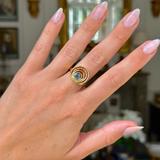 John donaldson sculptural aquamarine ring worn on hand.