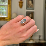 vintage marquise cut aquamarine ring, worn on closed hand,  front view. 
