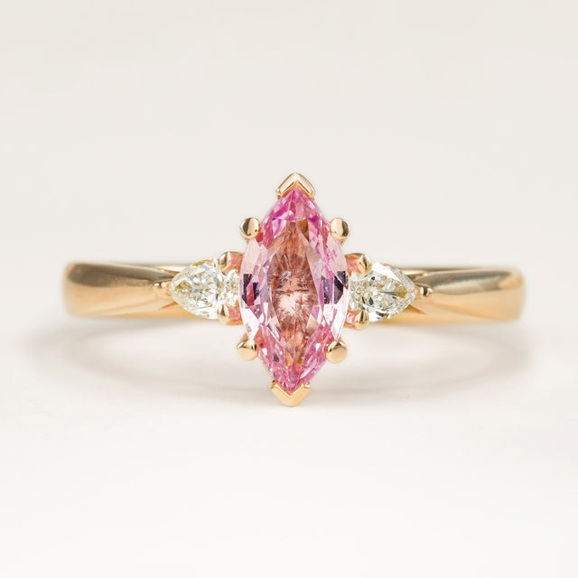 Marquise-cut Padparascha Pink sapphire and diamond three-stone engagement ring