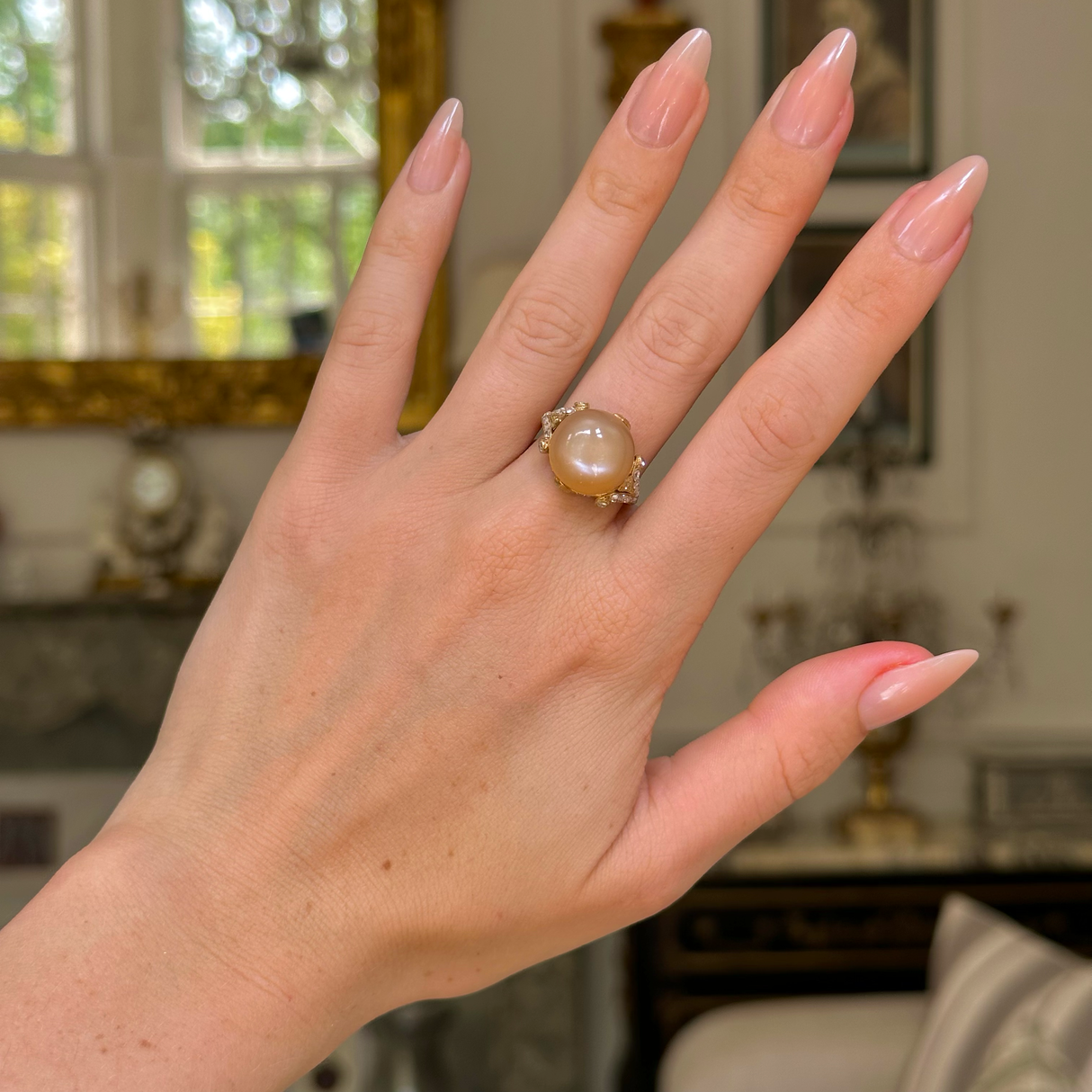 Belle Époque, 18ct gold, cabochon peach moonstone & diamond ring