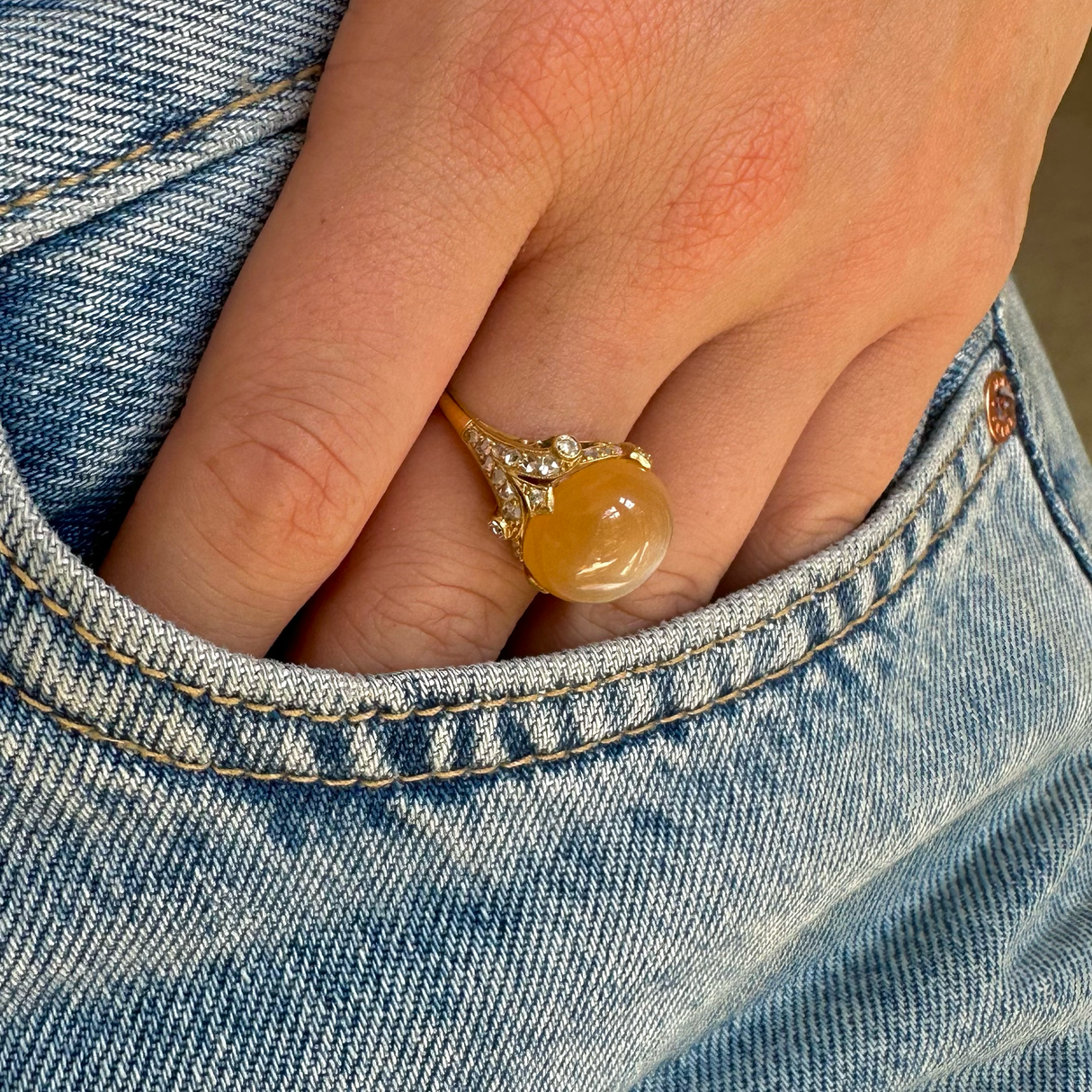 Belle Époque, 18ct gold, cabochon peach moonstone & diamond ring