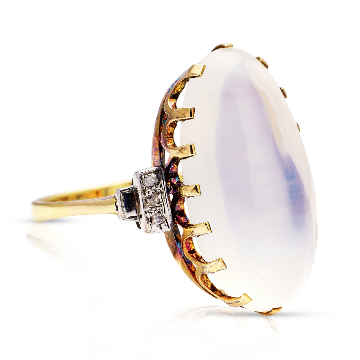 Moonstone and diamond ring, side view.