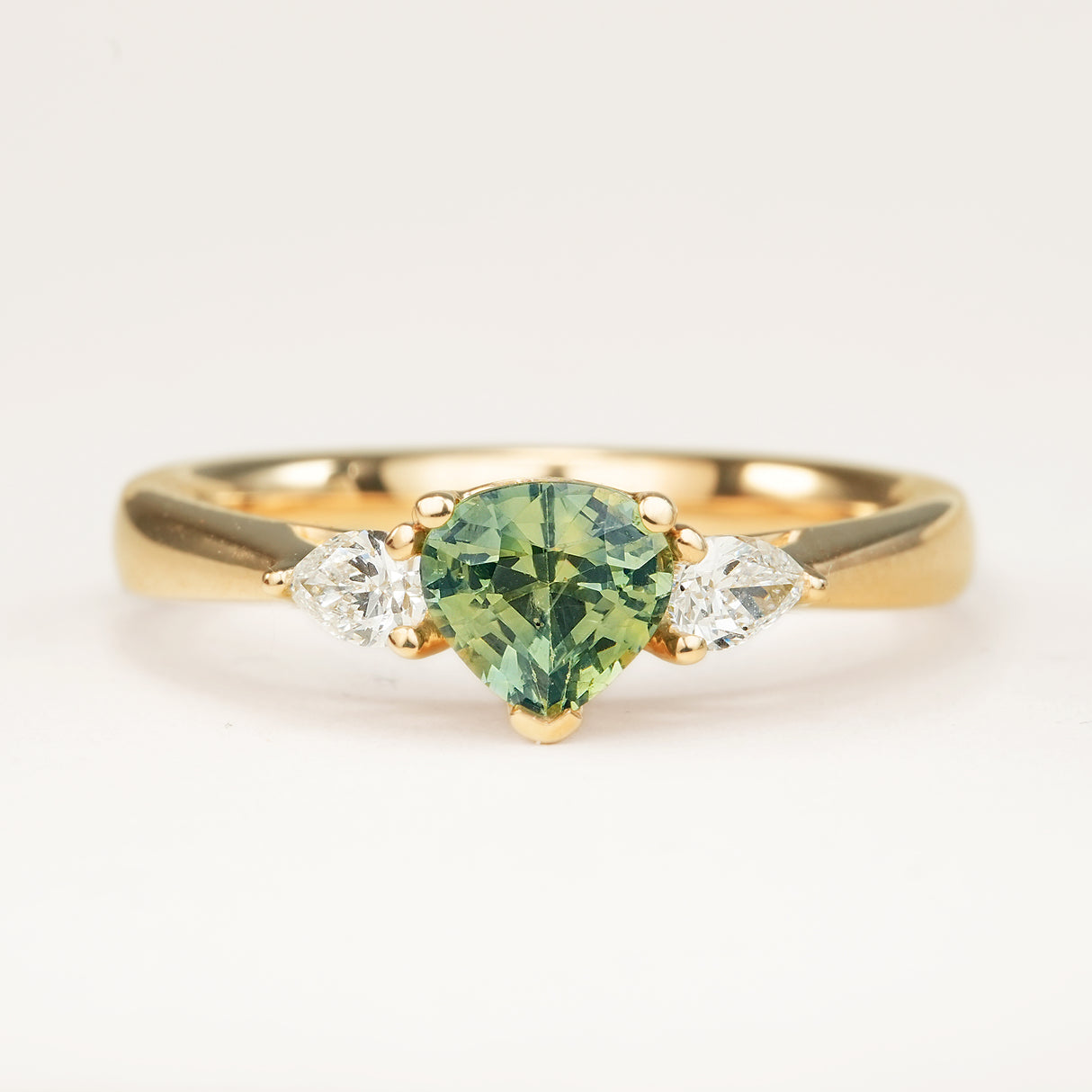 Pear-Cut Green Sapphire and Diamond Three-Stone Engagement Ring