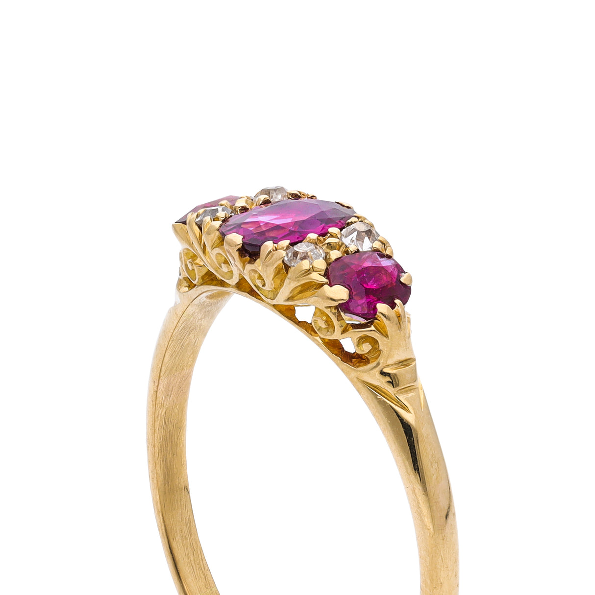 Antique Edwardian three stone ruby and diamond ring, side view. 