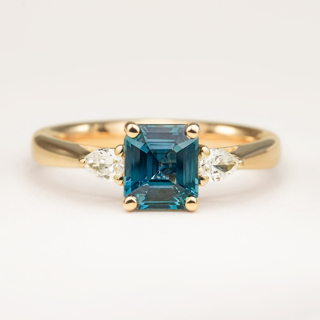 Square-Cut Teal Sapphire and Diamond Three-Stone Engagement Ring