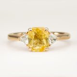 Yellow sapphire and diamond three-stone engagement ring