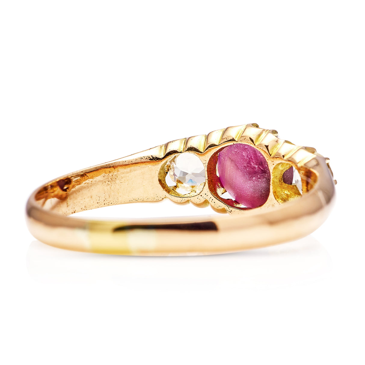 Antique, Edwardian cabochon star ruby and white sapphire three-stone ring, 15ct gold