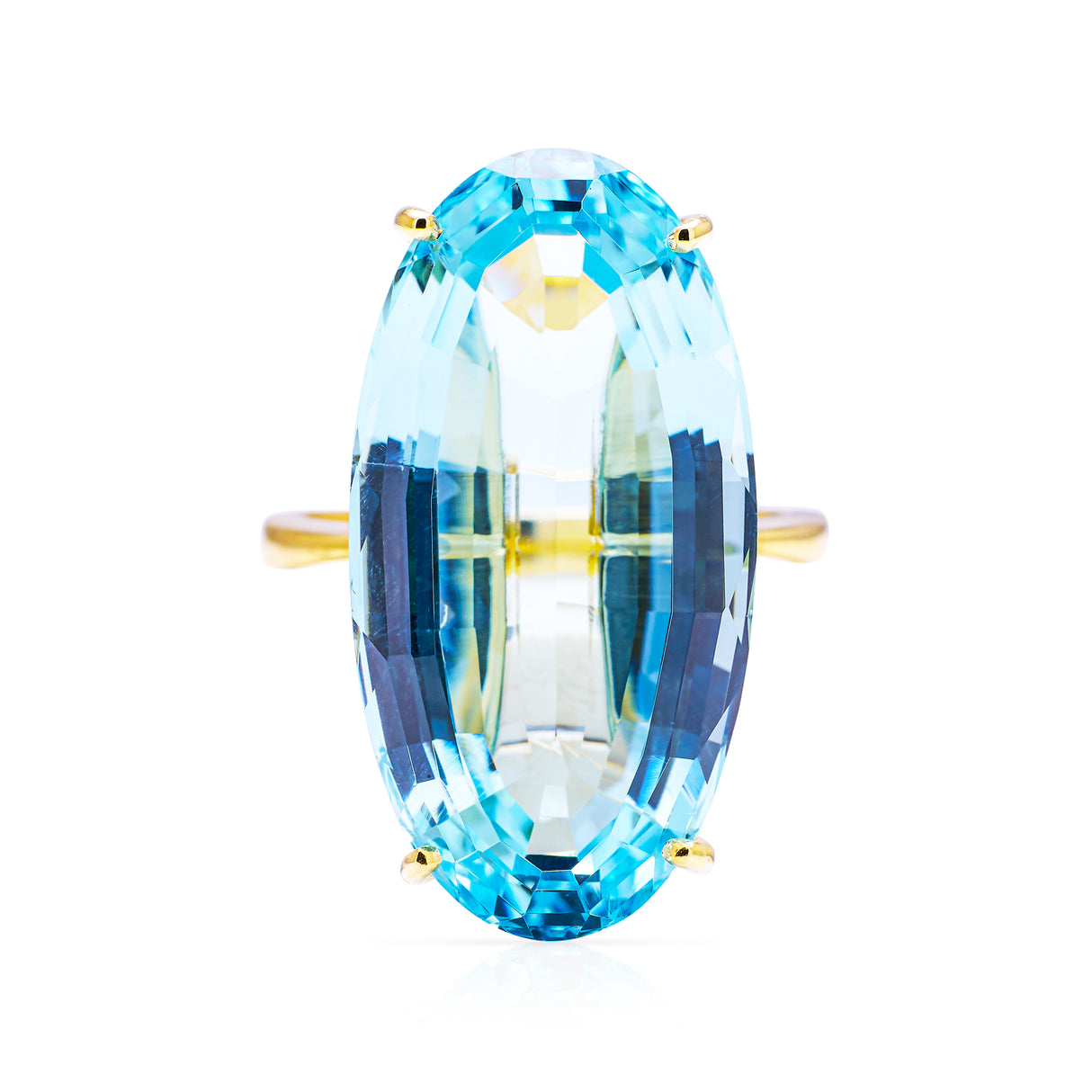 Large aquamarine and yellow gold cocktail ring on a white background, front of ring perspective. 