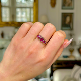 Victorian five-stone garnet and yellow gold ring, worn on closed hand. 
