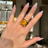 vintage cartier citrine cocktail ring worn on hand.