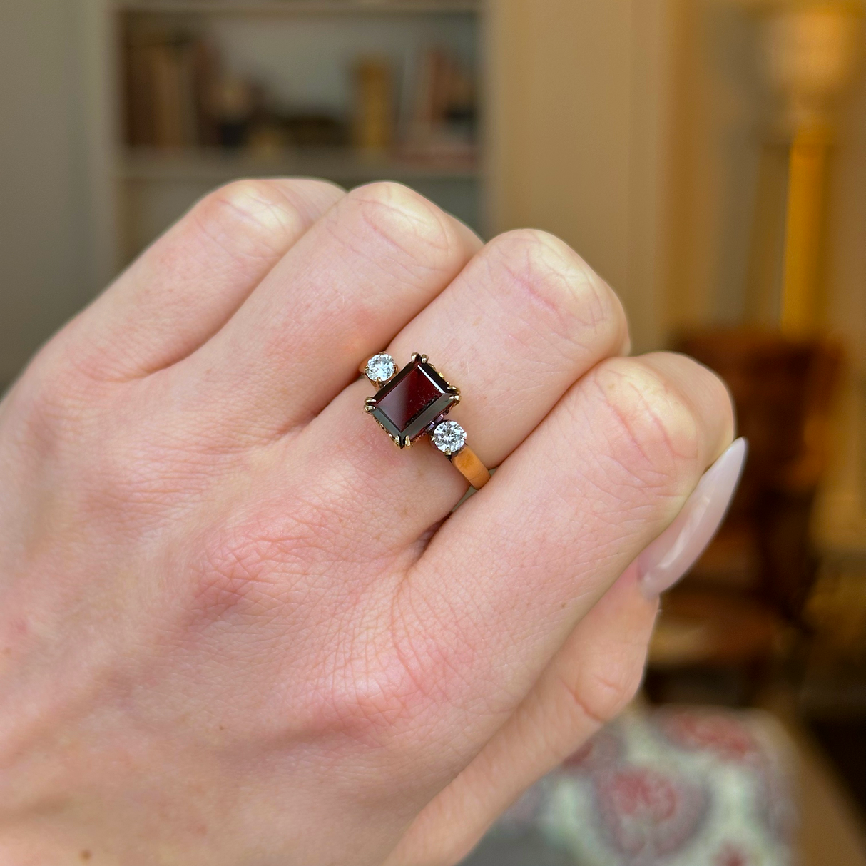 Vintage, 1940s Three-Stone Garnet and Diamond Ring, 18ct Rosy Yellow Gold worn on closed hand.