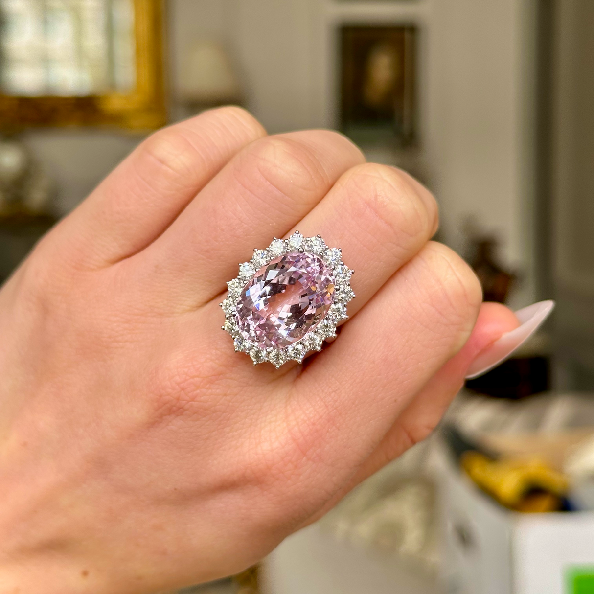 Vintage morganite cocktail ring, worn on closed hand. 