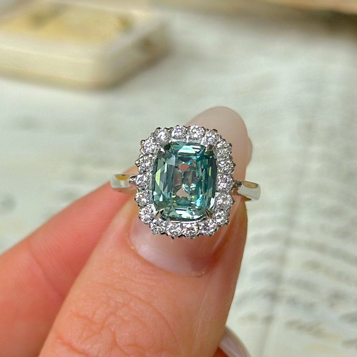 Vintage, 1960s Teal Sapphire and Diamond Square Cluster Ring, 18ct White Gold worn on finger.